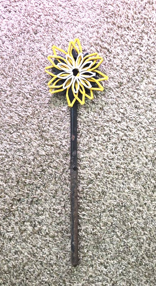 Plasma-cut steel sunflower garden stake finished in yellow and white paint