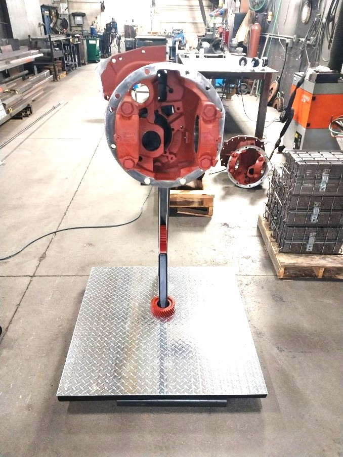 Diamond plate rolling stand built for mounting a clutch housing assembly